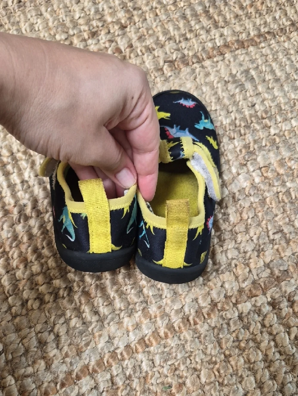 Toddler's dinosaur print water shoes are from the brand Nerteo. 10 Water Shoes